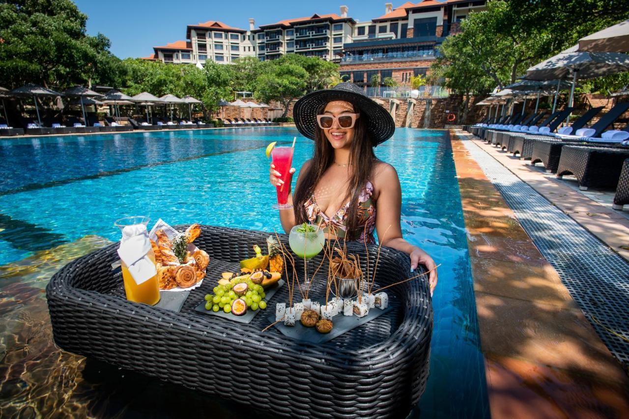 Отель The Capital Zimbali Баллито Экстерьер фото Poolside at the hotel